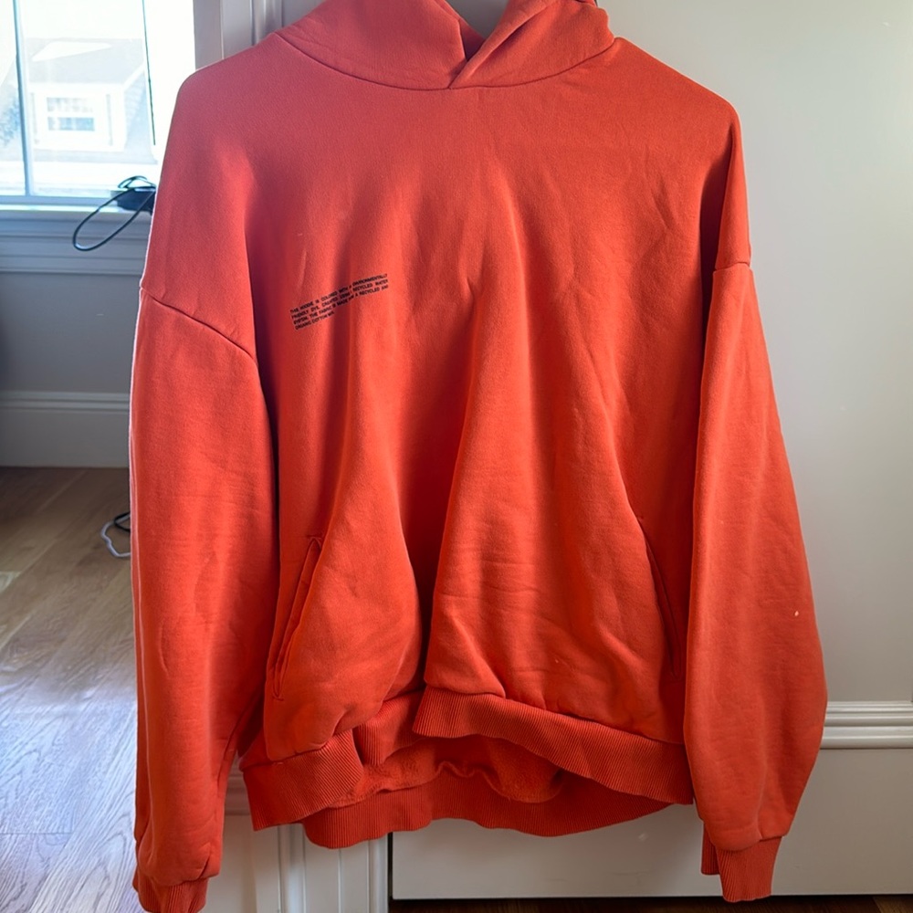 Orange Pangaia hoodie